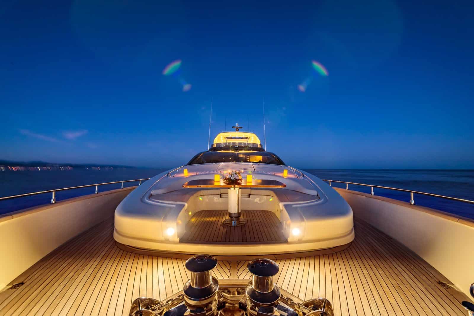 Beautiful shot from the yacht of the sea under a dark blue sky at night time
